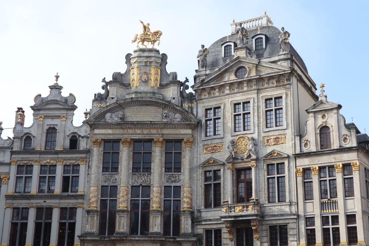 Mastering the First Impression: Your intriguing post title goes here Captivating facade of Gothic and Baroque architecture at the Grand Place in Brussels, Belgium.